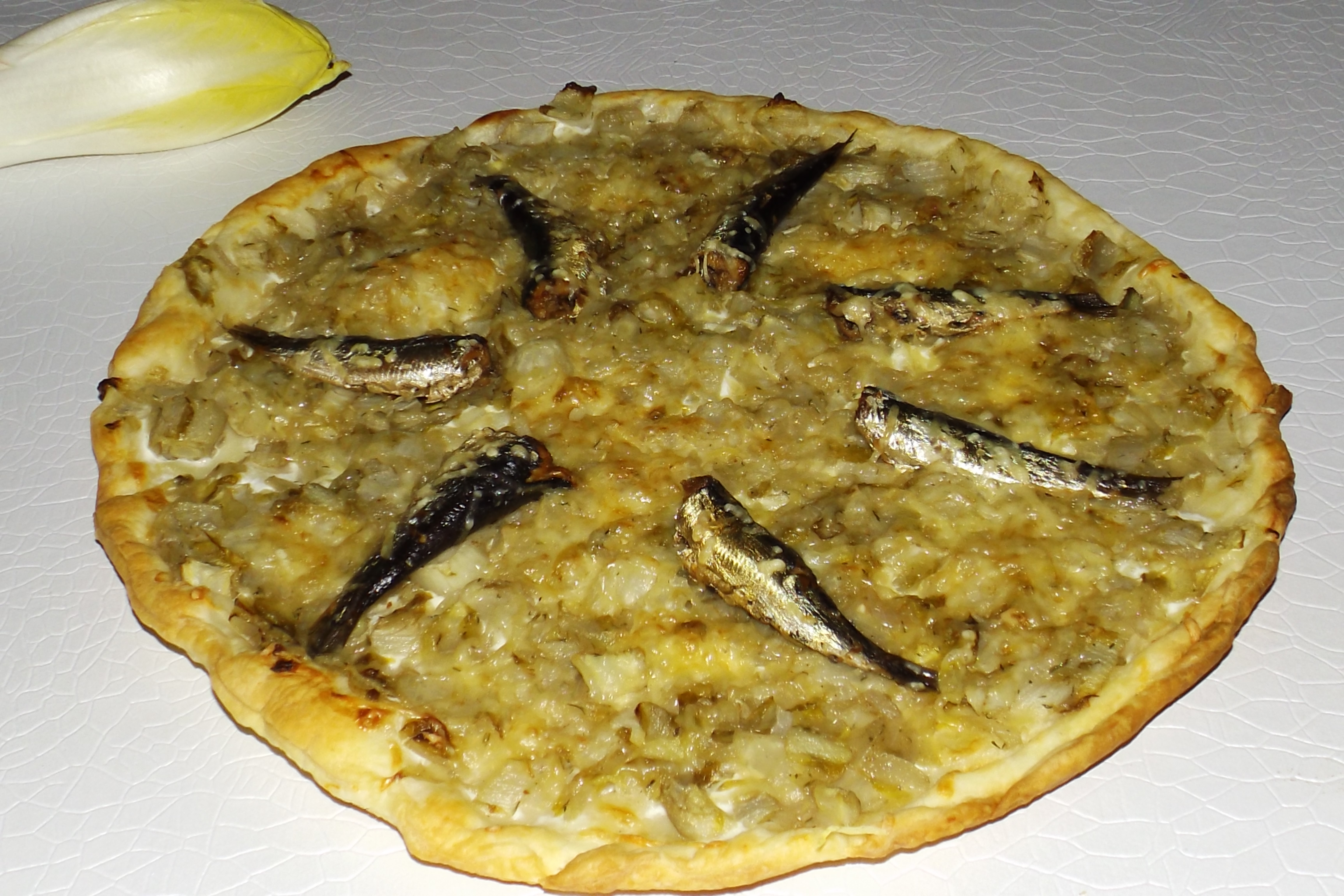 Tarte aux endives et aux sardines piquantes